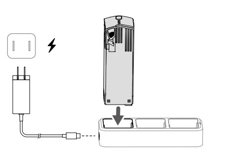 Lắp pin vào khay sạc và sạc pin.